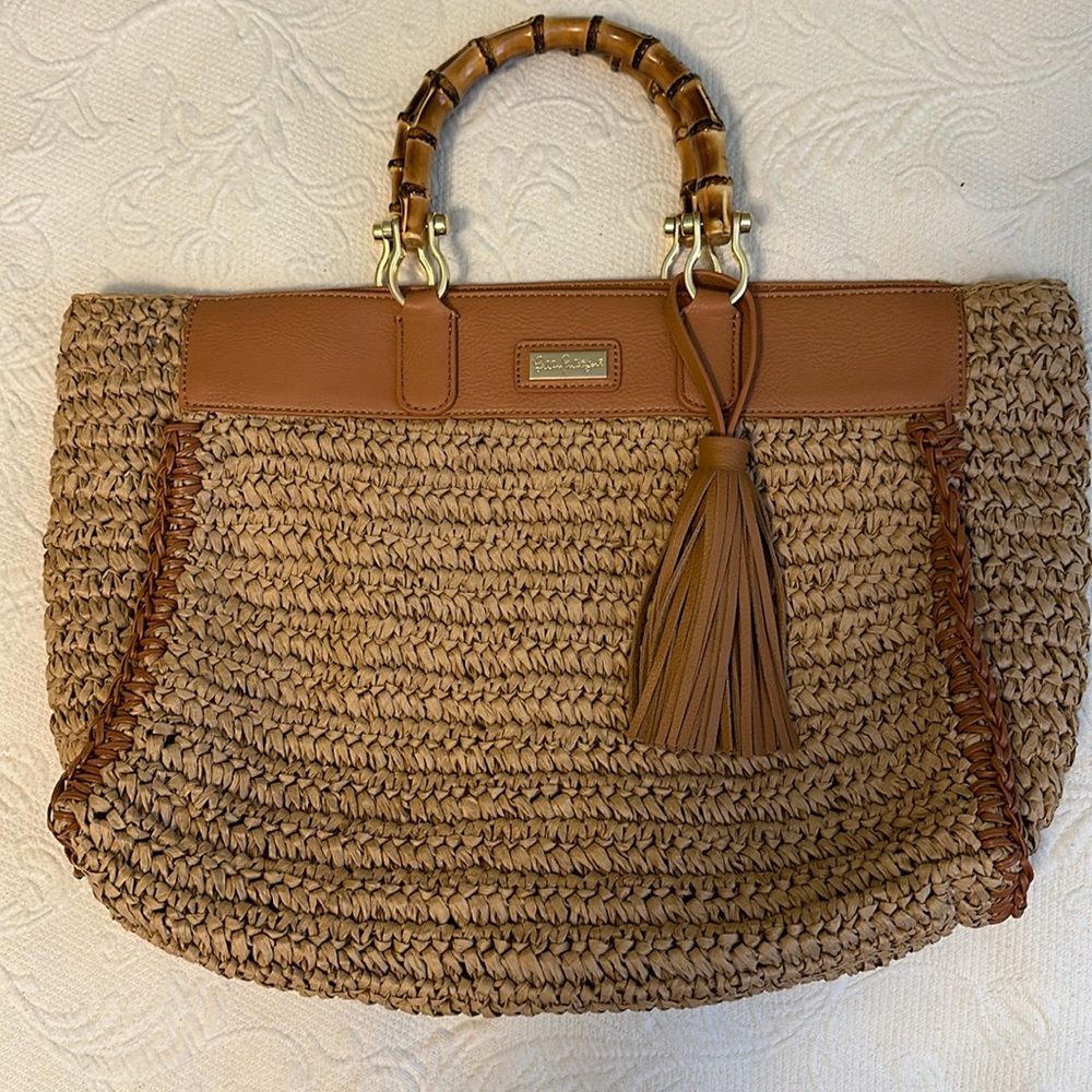 Brand NEW. Never used. Currently out of stock. Lily Pulitzer summer straw bag